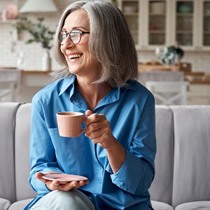 Patient in Hackettstown with dental implants relaxing