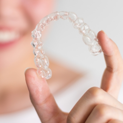 Closeup of Invisalign clear braces tray