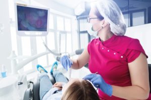 intraoral camera being used during a dental appointment