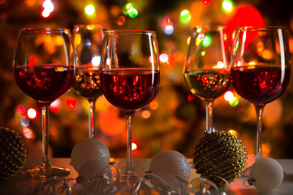 glasses of drinking red wine during holiday season