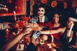 Friends having drinks at a Halloween party
